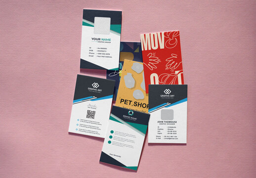 Mockup from real photo of Several blank Business Cards lie on a pink surface.