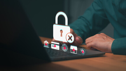 Man using laptop facing cyber security data breach. Internet safety, fraud, scam, and technology hacker issues. Business privacy protection and credit card account error.