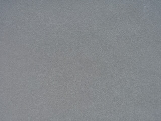 Whispering shades of gray dance across the textured tranquility of an intimate paper landscape