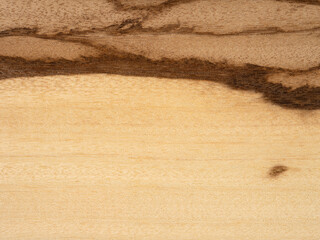 A close up of a piece of antique wooden surface