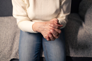 Senior woman hands showing arthritis and joint pain
