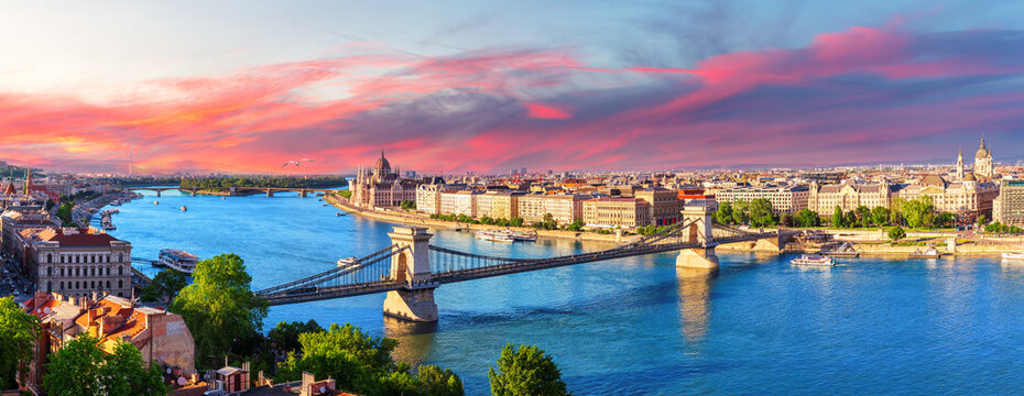 Skyline sunset view of Budapest with Parliament building, Chain Bridge and Danube river, Hungary