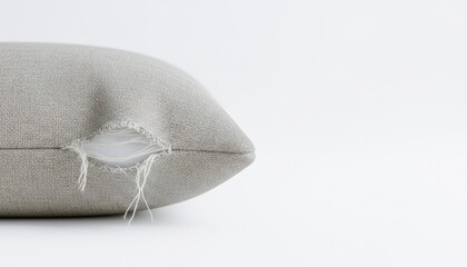 Textured Woven Fabric Pillow on a Neutral Gray Background Creating a Calm Minimalist Aesthetic