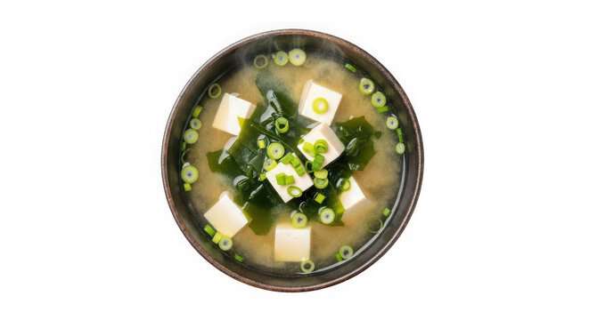 Bowl of miso soup with tofu and seaweed, of transparent