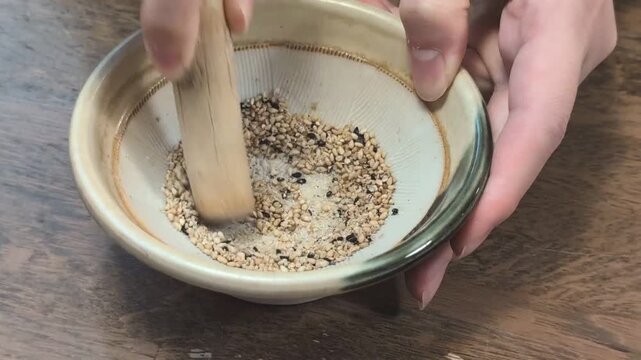 ゴマすり