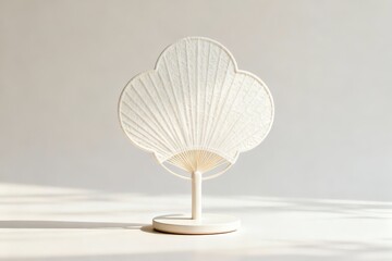 White decorative fan on stand