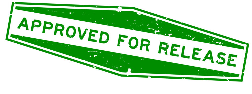 Grunge green approved for release word hexagon seal stamp on white background