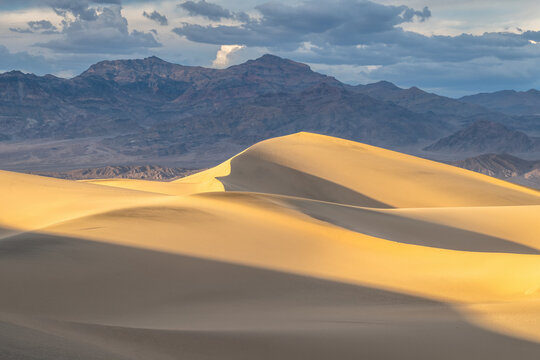 Mesquite Flat Sand Dunes with a mountain backdrop, Death Valley National Park, California, USA
