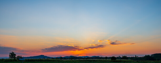Naklejka premium Beautiful landscape with sunset sky. Nature background.