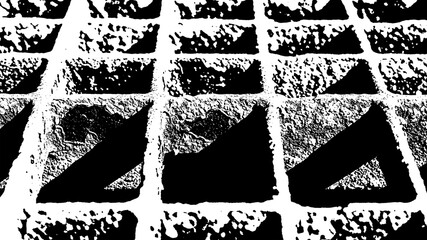 Monochrome pattern of square bricks or tiles with textured surfaces and deep shadows, architectural...