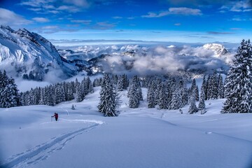 Ski tour to the Lachenstock mountain above Lake W&auml;gital. Fantastic skitour in the snow-covered mountains with breathtaking views. Skimo near the Mountain Mutteristock. Swiss Alps. High quality photo