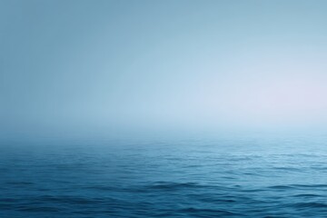 Fototapeta premium Minimalist foggy blue sea and sky, soft gradient tones, calm atmosphere, copy space