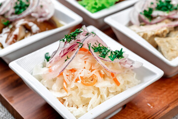 Close-up of sauerkraut (fermented cabbage with carrots), a traditional Russian and Eastern European...