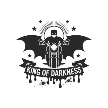 Silhouette of a superhero on a motorcycle with large bat wings and a banner reading King of Darkness