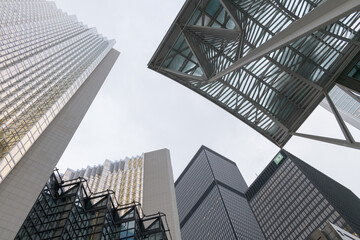 Naklejka premium looking up at towers in the financial district including the Allen Lambert Galleria canopy at Brookfield Place, with Royal Bank Plaza and TD Centre, Toronto