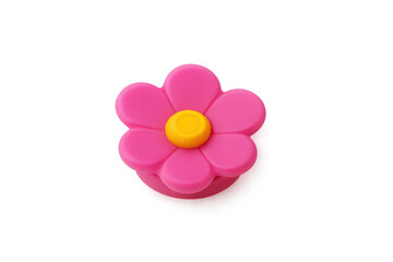 Pink plastic flower button with yellow core