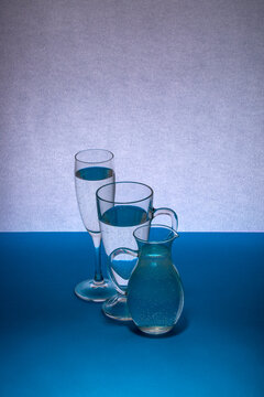 Glassware on a gray-blue background on the table