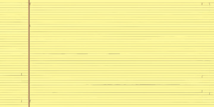 Close up of a yellow legal pad with faint writing and lined paper