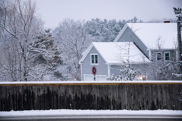 House covered by snow in winter season in Maine, USA