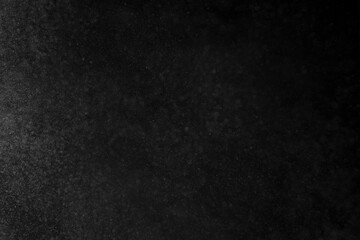 Fototapeta premium VFX dust particles embers depth of field debris falling on black background visual effects