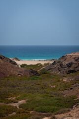 Castle beach, near the town of El Cotillo, in the north of Fuerteventura, in the Canary Islands, Spain, is a long sandy beach surrounded by cliffs along the Atlantic Ocean.