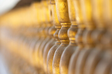 Golden temple pillars with a gradient of sharpness