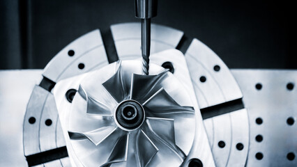 CNC modern milling machine produces a metal turbine,  industrial concept background © Aleksandr Matveev