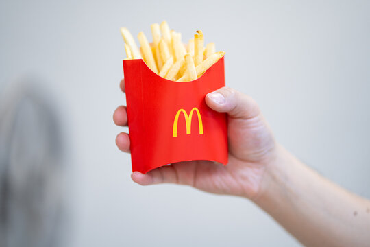 Pathum Thani ,Thailand - 25 Jan 2026: McDonald's menu on hand of man, space for text and isolated concept.