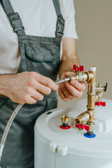 Man fixing water heater