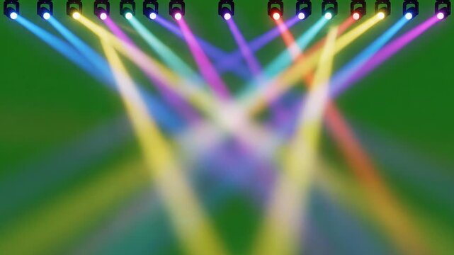 Vibrant stage lights shining on empty green performance space