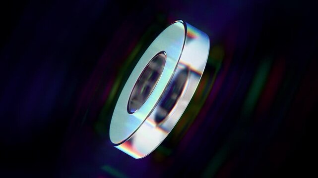 Looped dynamic animation of a torus shape made of liquid glass material. Animation with rays of light refraction with the effect of gradient color transition. Animation of a glass shape with the effec