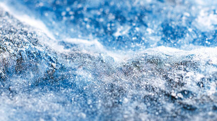 Obraz premium Abstract blue texture of ice, crystals, snow or stone. Cold winter background with natural patterns. Seasonal design, climate concepts, minimal backdrops and creative layouts.