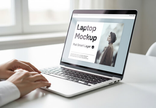 A woman using a laptop - mockup