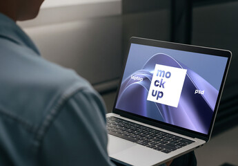 A man using a laptop - mockup