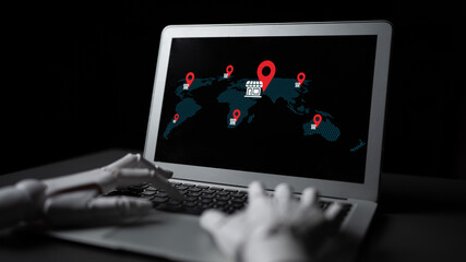 A robot hand interacts with a laptop displaying a digital map featuring red markers, symbolizing locations of interest across the globe, illustrating technology role in exploration. Gantry