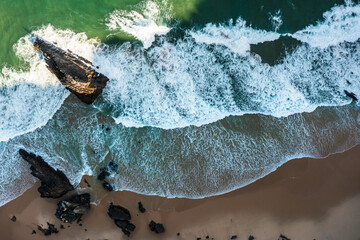Fototapeta premium Abstract ocean waves background with rock, Portugal