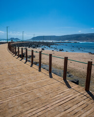 Wooden Boardwalk Along Rocky Beach in Cape Verde