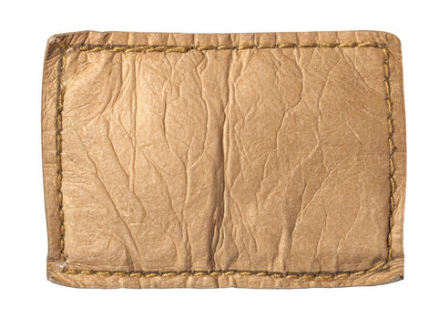 Blank brown leather jeans label patch with stitching