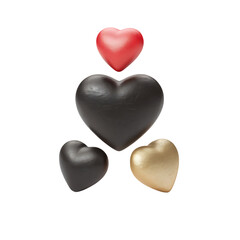 A vibrant red heart balanced atop a pair of contrasting black and gold hearts
