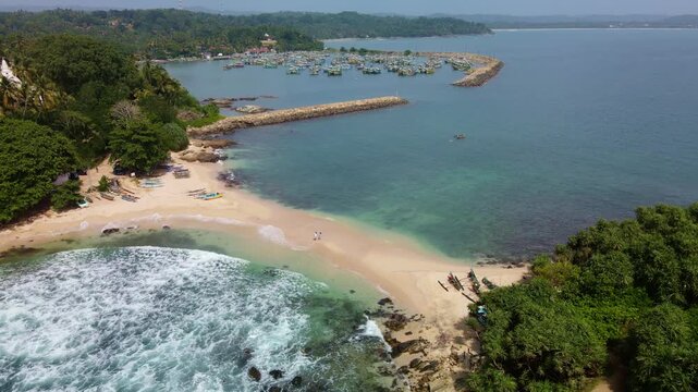 A view from above of the sandy isthmus between the island and the mainland. Blue Island, at the southern tip of Sri Lanka, is an increasingly popular tourist destination.