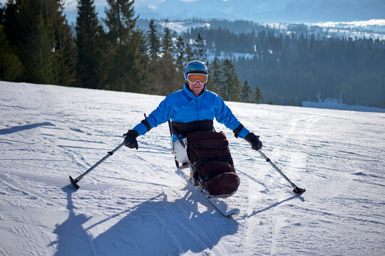 Active recreation for skiing for a wheelchair user