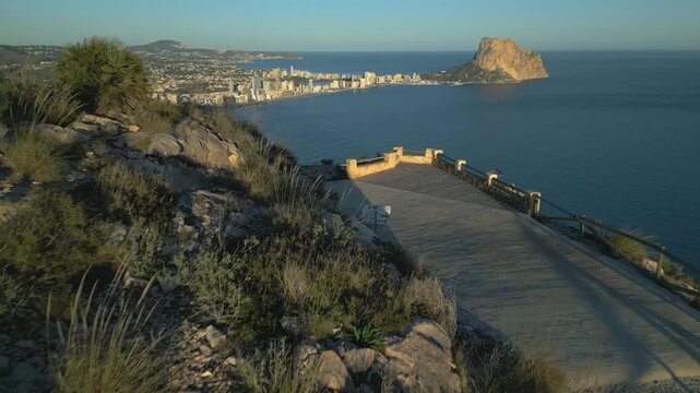 Revealing aerial view of calpe city and penon de ifach rock