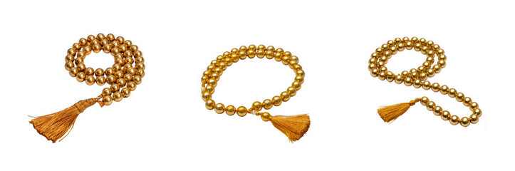 Obraz premium Three golden malas with tassels arranged in different shapes on transparent background high quality professional detailed