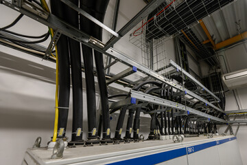 Naklejka premium Cable wiring on a tray in a substation.