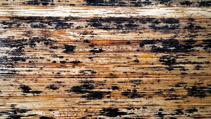 Grungy distressed wood with dark paint marks and rugged surface, Vintage weathered wooden panel...