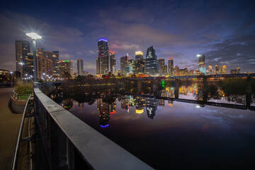 Austin Downtown modern office hub of world technology center business urban city landscape of skyscraper and travel destination park along the river and park in capital city of Texas, USA at sunset