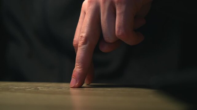 Fingers move along the surface.
A person demonstrates walking with their hands.
Fingers like a person.
Finger gait