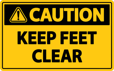 Obraz premium Yellow Caution Sign Keep Feet Clear Warning Notice