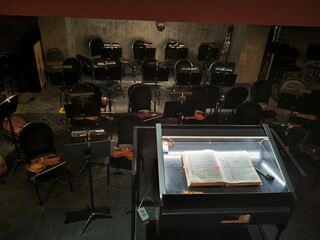musical instruments in the orchestra pit during intermission
