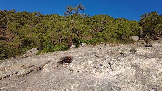 Antalya, &Ccedil;ıralı: Yanartaş (Chimera) in Olympos National Park. A natural methane gas flame that emerges from the rocky slope without extinguishing. A legendary and geological natural beauty.